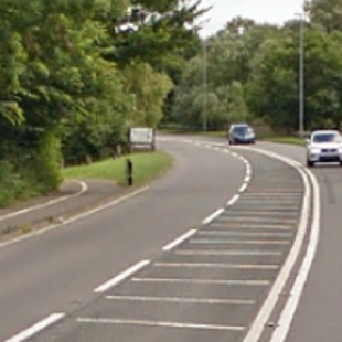 Road with double white line and hatched area